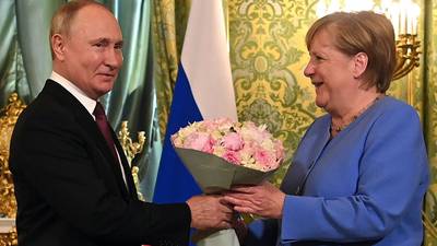 Merkel says she didn’t have political strength to influence Putin