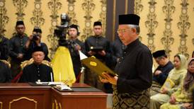 Malaysian ruling coalition retains power despite worst electoral showing