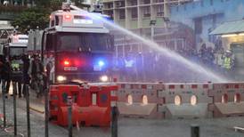 Hong Kong protests: police fire teargas and water cannon and arrest 29