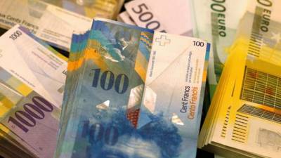 Swiss franc jumps nearly 30% after euro cap is scrapped