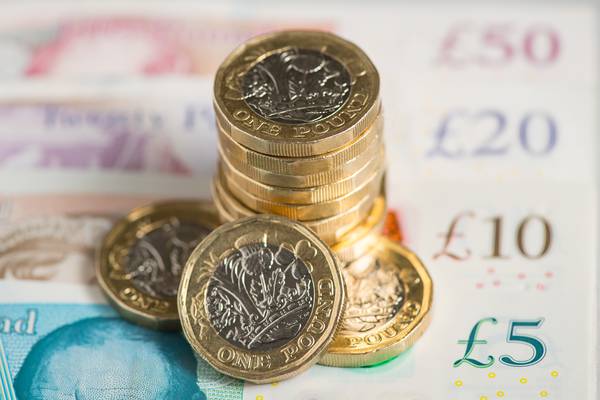 UK pauses drive to raise minimum wage