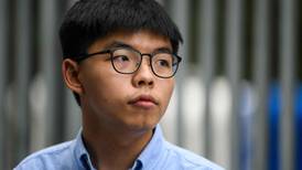 Hong Kong bars 12 pro-democracy candidates from running in key election