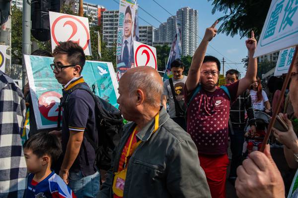Record numbers vote in Hong Kong amid angry calls for democracy