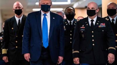 Trump wears face mask in public for the first time