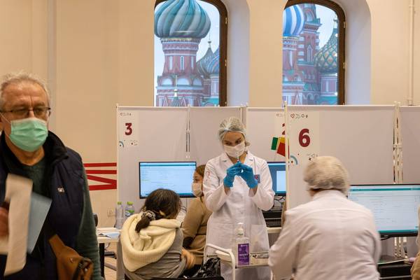 Russia’s death toll rises as vaccine tourism and fake Covid passes soar