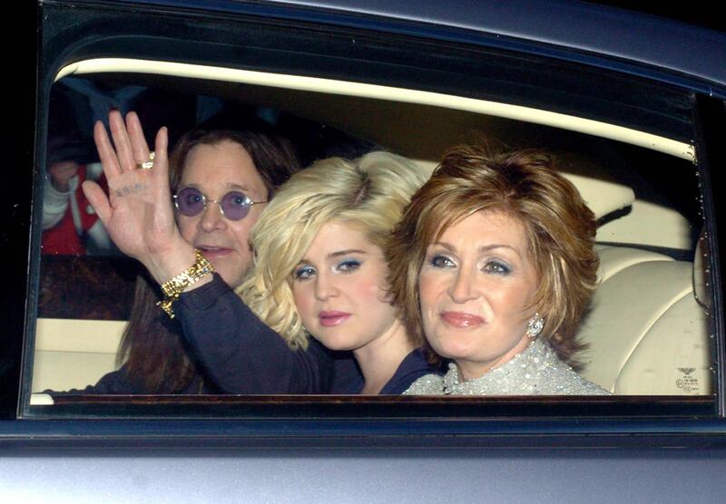 Ozzy Osbourne with his wife, Sharon, and daughter, Kelly arriving at the Hertfordshire home David Beckham and his wife Victoria for their pre-World Cup party in 2006. Photograph: Chris Radburn/PA Wire