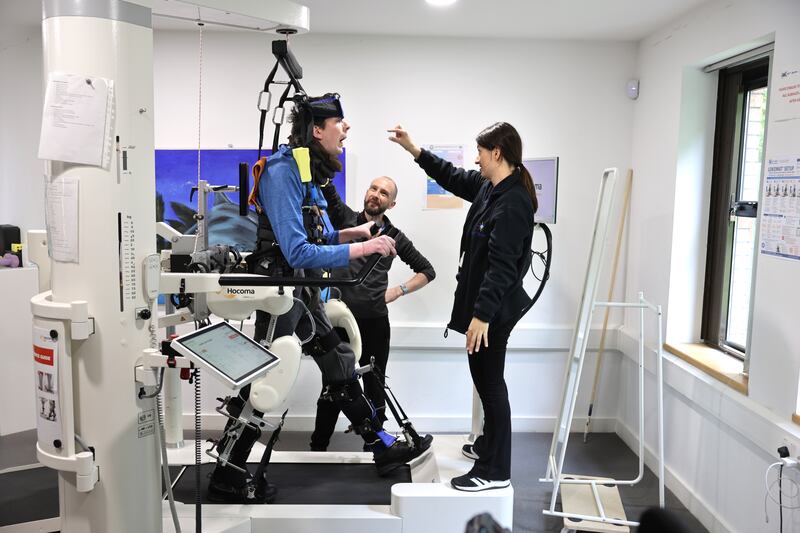 Pádraig Schaler, with Mark Brennan, his personal assistant, and Paula Carnevali, senior physio and clinical lead, at An Saol. Photograph: Dara Mac Dónaill
