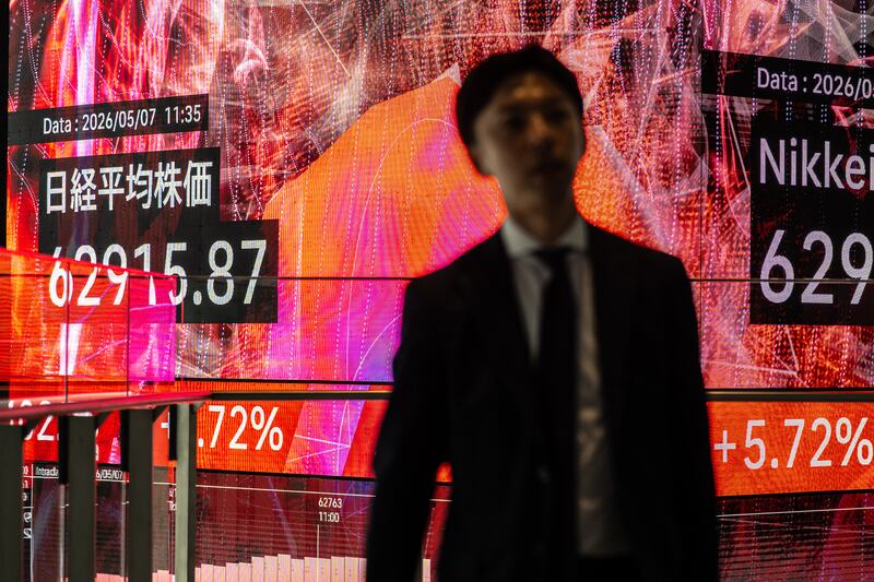 An electronic quotation board displays the Nikkei 225 stock prices on the Tokyo Stock Exchange in Tokyo on Thursday. Photo by Philip Fong/AFP via Getty Images