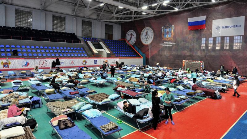 People reported to be from Mariupol occupy a temporary accommodation centre for refugees in a school gymnasium in Taganrog, Rostov region, Russia, on Monday. Photograph: Arkady Budnitsky/EPA
