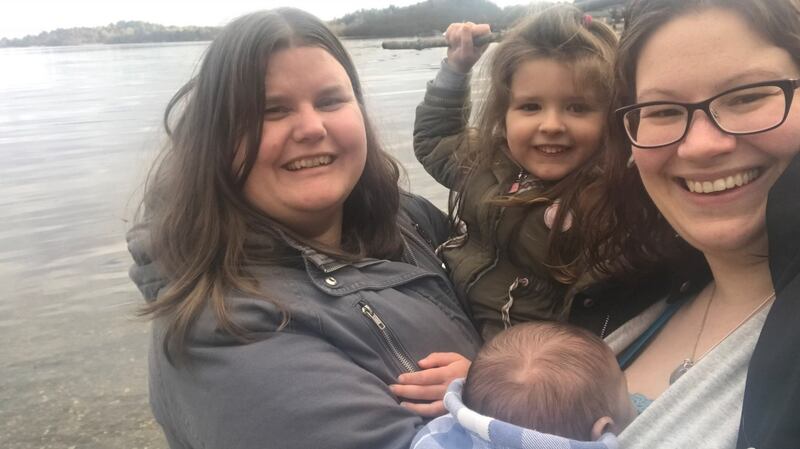 Angela Tuite (right) with her wife, Caroline, daughter Caitlin and son Tiernan, on the shores of Loch Lomond in Scotland.