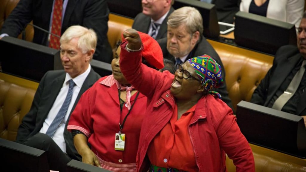 A member of the oppostion party Economic Freedom Fighters reacts during a debate over the removal of the president in parliament in Cape Town, South Africa, on Tuesday. Photograph: Nic Bothma/EPA