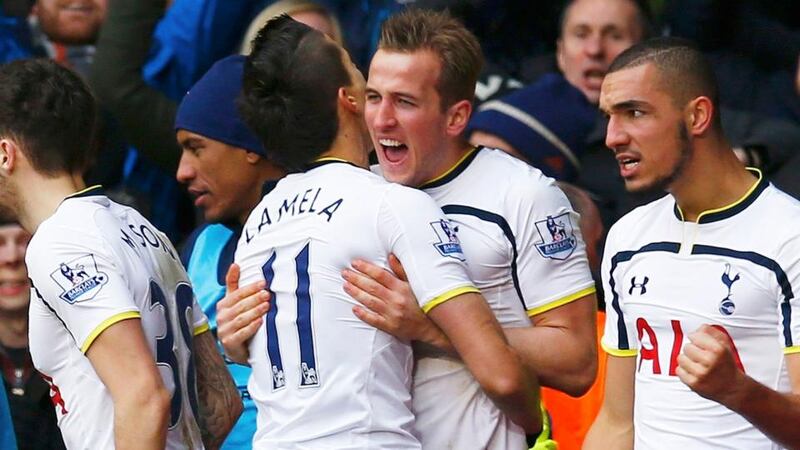 Harry Kane (second righ) of Tottenham Hotspur celebrates scoring against Arsenal at White Hart Lane. Photograph: Eddie Keogh / Reuters