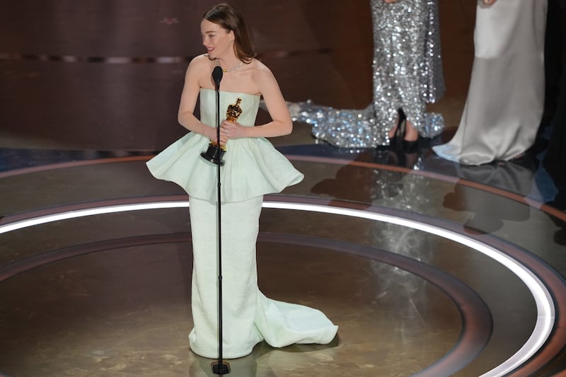  Emma Stone accepts the award for best actress in a leading role for Poor Things. Photograph: Amir Hamja/The New York Times