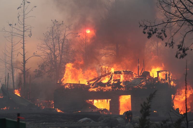 Several properties in the area were destroyed. Photograph: Hung T Vu/The Record Searchlight/AP