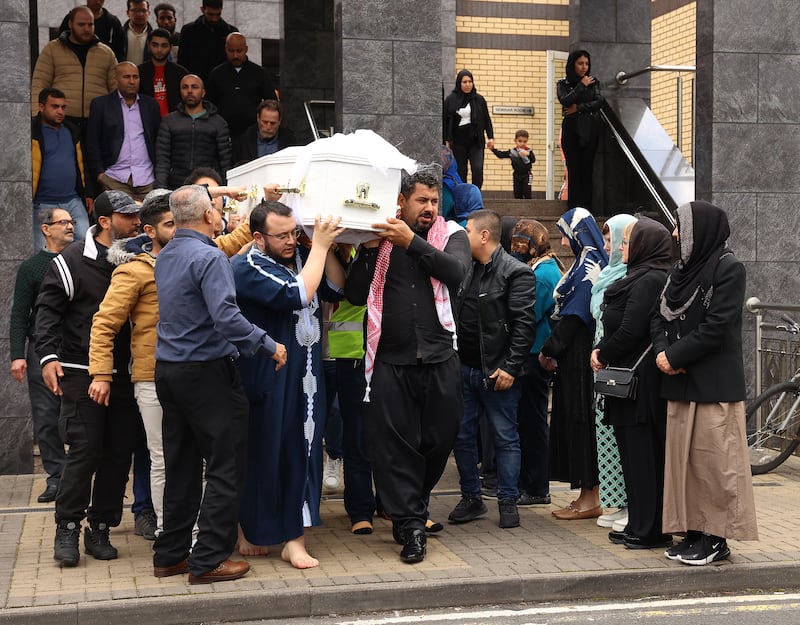 The coffin of Dlava Mohamed (16) is carried from Clonskeagh Mosque in Dublin after her funeral on Thursday. Photograph: Damien Eagers/PA Wire