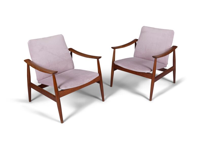 Finn Juhl’s pair of teak Model FD138 armchairs