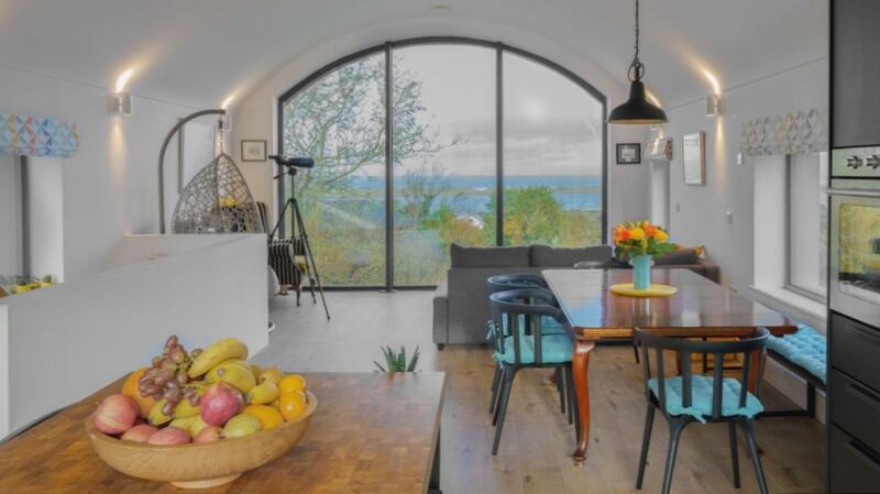 The upstairs dual aspect kitchen with gable walls made of glass opens out onto spectacular views. Photograph: Joe McCallion