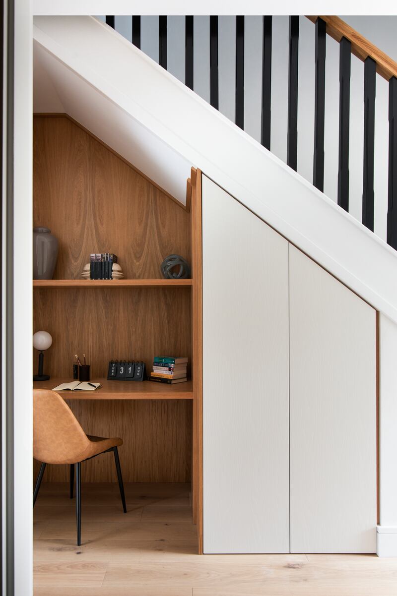Under-stairs home office solution by Optimise Design. Ensure you get the best chair you can afford, one with proper lumbar support and armrests, and make sure you can adjust the seat height for comfort. Photogaph: Anna Wickhan