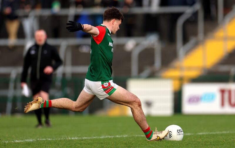 Ben O’Carroll  of St Brigid's scores a penalty against Corofin. Photograph: Inpho
