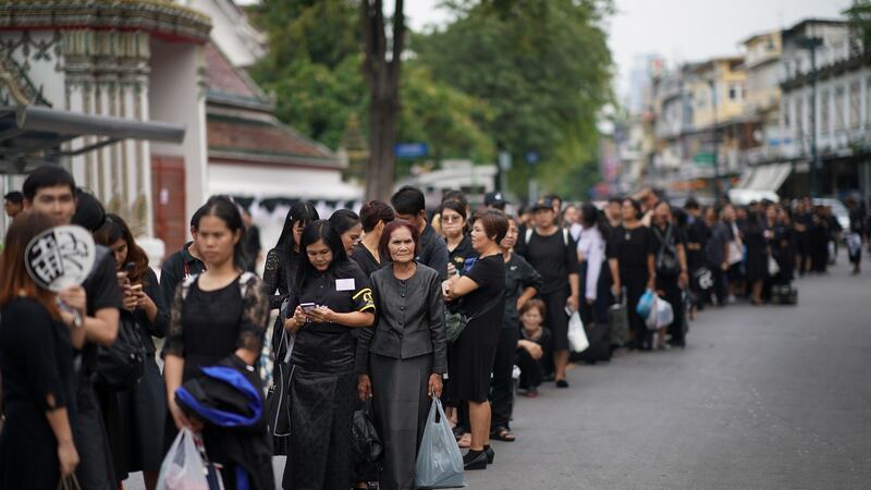 People queue to attend the funeral of the late Thai King Bhumibol Adulyadej on  in Bangkok, Thailand. Photograph:  Christopher Furlong/Getty Images