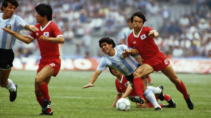 ‘He sent his whole team out to lay into me’: Argentina’s Diego Maradona is fouled by South Korea players during their meeting  at the 1986 World Cup in Mexico. Photograph: David Cannon/Getty Images