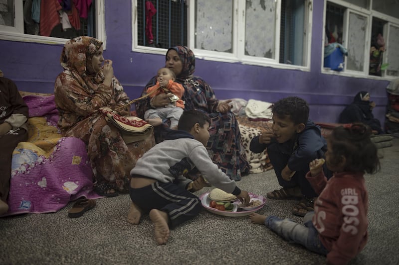 Internally displaced Palestinians spend the night at a United Nations school in Khan Younis, southern Gaza. Photograph: EPA-EFE