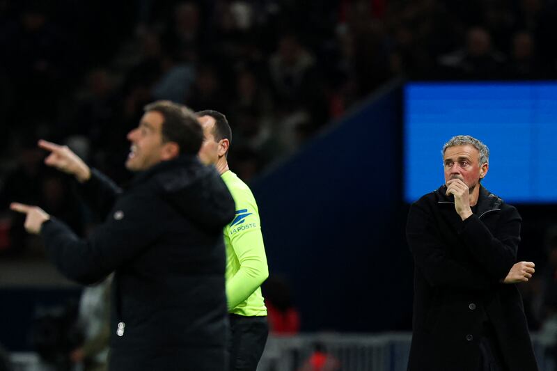 Paris Saint-Germain head coach Luis Enrique (right) has brought European success to the French club but is, apparently, not the kind of coach Chelsea would want. Photograph: Anne-Christine Poujoulat/AFP via Getty Images