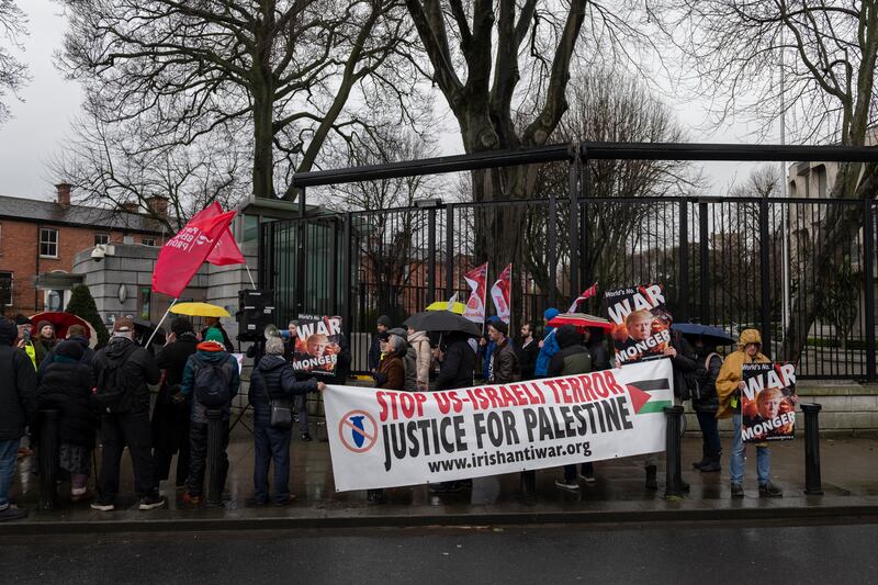 Protesters take part in a demonstration organised by the Irish Anti-War Movement against the use of Shannon Airport by the U.S. military for attacks on Iran, outside the Embassy of the United States of America in Dublin last week. Photograph by Paulo Nunes dos Santos