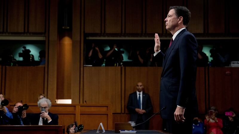 Former FBI director James Comey before a US senate Intelligence Committee hearing on Russia’s alleged interference in the 2016 US presidential election. Photograph: Andrew Harnik/AP