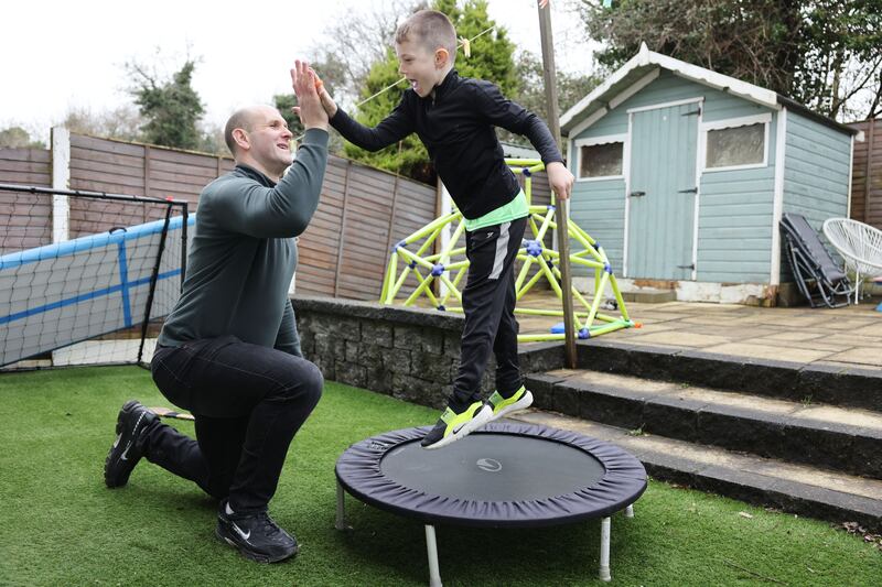 Rory O’Connor with his son Zach (7).  Photograph: Alan Betson
