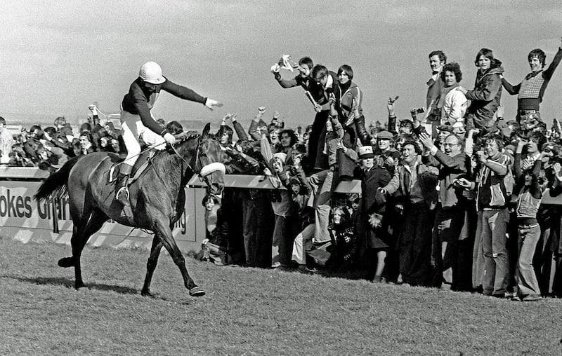 Red Rum, ridden by Tommy Stack, romps home at Aintree to make National Hunt history. Photograph: PA