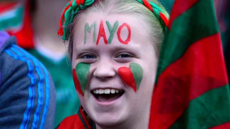 I love Mayo: A fan in green and red  during the All-Ireland football final between Dublin and Mayo at Croke Park. Photograph: Cyril Byrne/The Irish Times