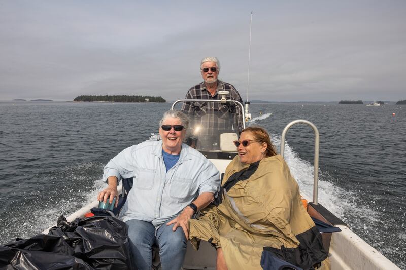 Charlotte Gale with Harry and Laura Fish. Photograph: Greta Rybus/The New York Times
                      