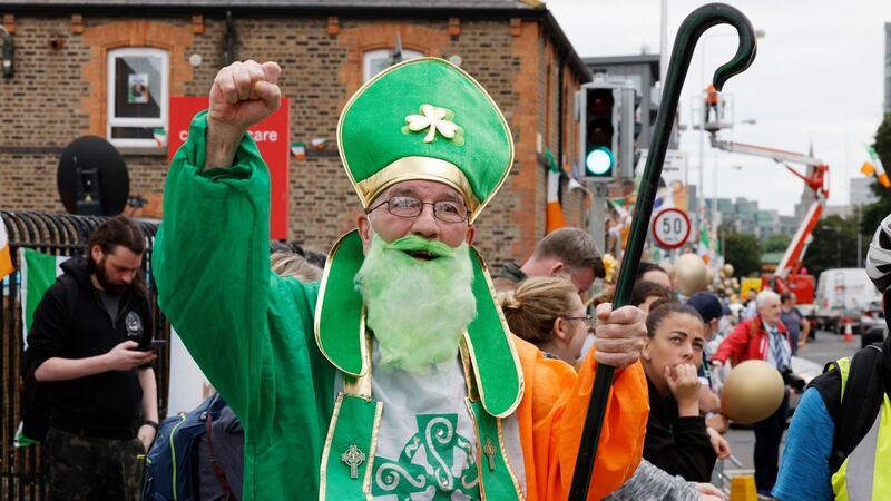 Liam Mooney  welcoming home  Olympic gold medal winning boxer Kellie Harrington to Portland Row in Dublin 1 on Tuesday. Photograph: Alan Betson