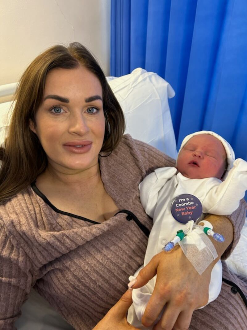 Wendy with her baby boy, the Coombe's first baby of 2025, who arrived
at 2.25am, weighing 3.59kg. Photograph: Collins