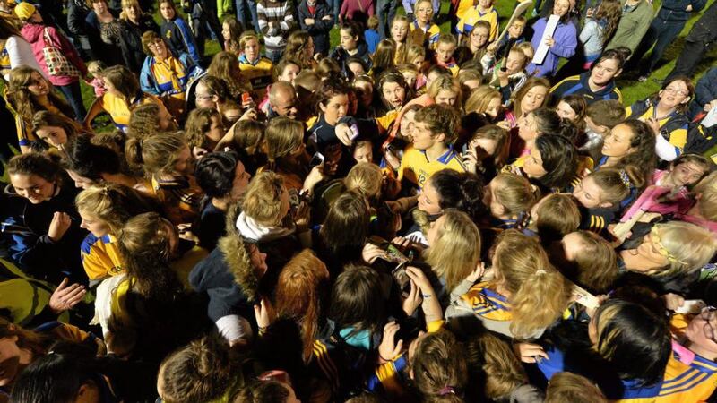 Golden moments: Clare supporters crowd around Shane O’Donnell after a charity game on Wednesday. Photograph: Diarmuid Greene/Sportsfile