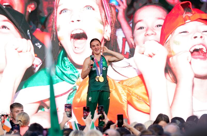 Kellie Harrington wearing her two gold medals speaks to the crowd during her homecoming. Photograph: PA 