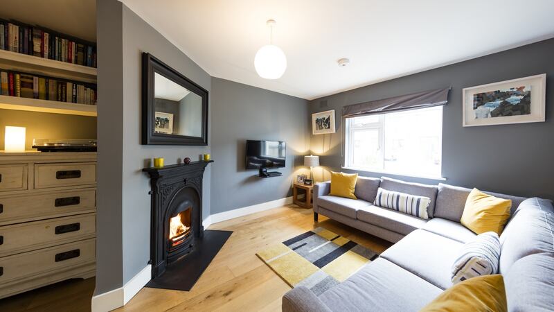 Living room with open fireplace