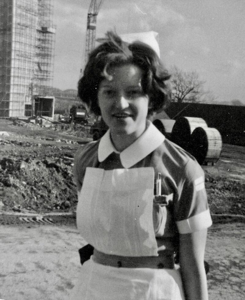 Ethel Corduff (nee Walsh) at  City General Hospital, Stoke on Trent, in 1965,  in front of a maternity hospital being built.