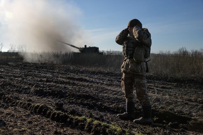 A Ukrainian soldier covers his ears during an operation to destroy Russian artillery in the Donetsk region of Ukraine this week. Photograph: Tyler Hicks/New York Times