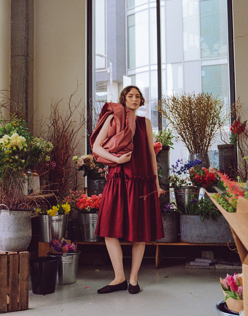 Moon dress in dark cherry linen €390. Large rose tote in dark rose techno taffeta €400