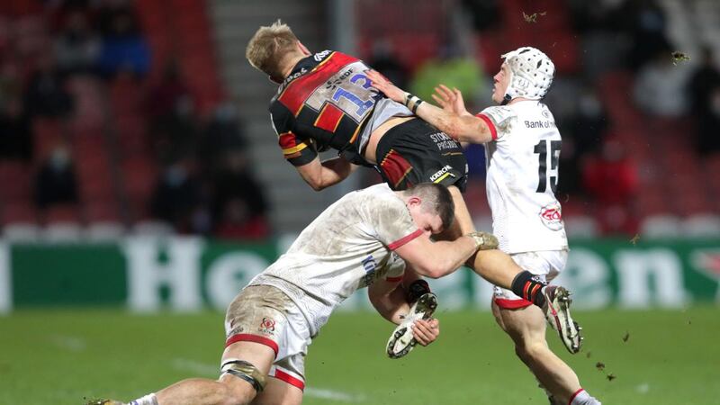 Gloucester’s Chris Harris is tackled by Ulster’s Nick Timoney and  Michael Lowry during the Heineken Champions Cup match at the Kingsholm Stadium. Photograph: David Davies