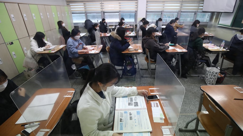 South Korean students take their College Scholastic Ability Test at a school amid the coronavirus pandemic on Thursday in in Seoul, South Korea. Photograph: Chung Sung-Jun/Getty Images