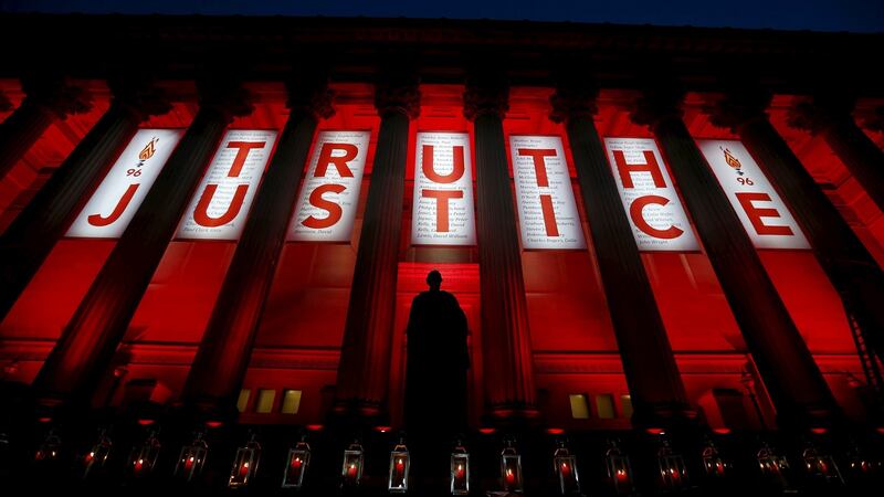 Liverpool’s St George’s Hall is illuminated following a vigil in memory of the victims of the Hillsborough disaster in the aftermath of the inquest verdict. Photograph:   Reuters