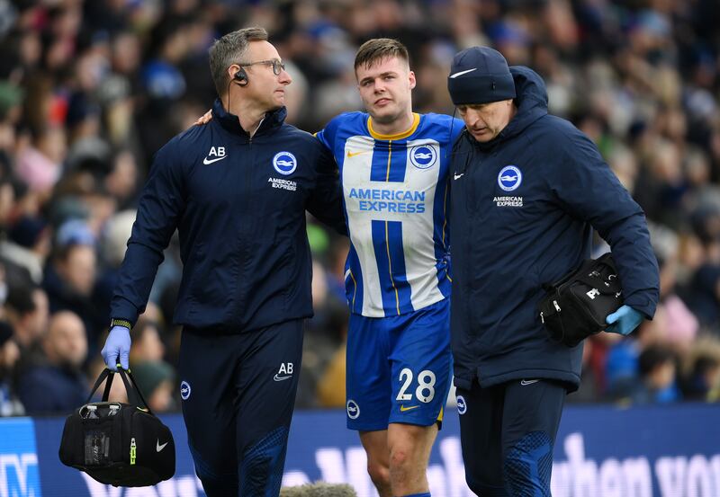 Brighton striker Evan Ferguson is helped off after a late challenge from Liverpool's Fabinho during the FA Cup fourth-round tie at the Amex Stadium. Photograph: Mike Hewitt/Getty Images