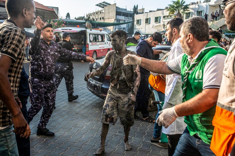 A severely injured man arrives at Al Shifa Hospital in Gaza City on Thursday. Photograph: Samar Abu Elouf/New York Times
                      