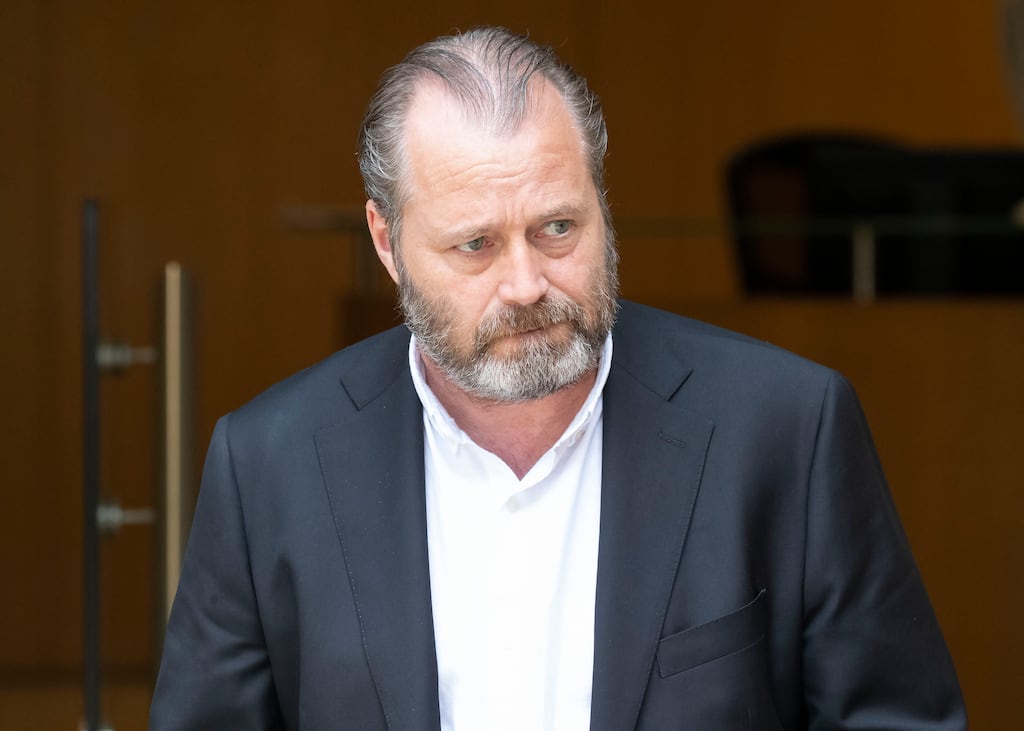Andrew McGinley leaving the Dublin District Coroner's Court after the opening of the inquests into the deaths of his children Conor, Darragh and Carla. Photograph: Colin Keegan/Collins