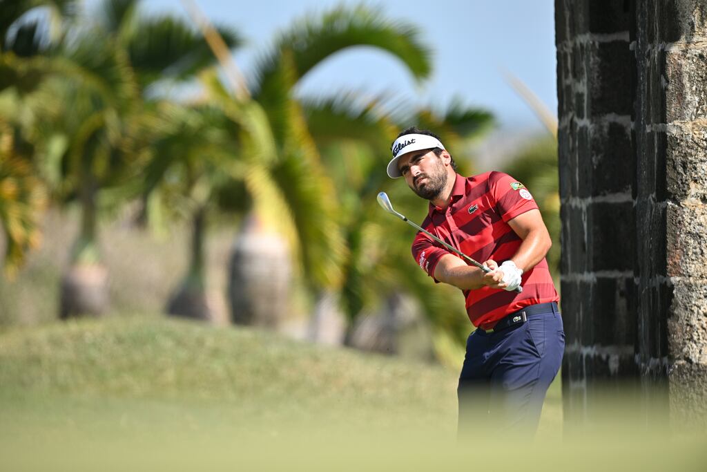Antoine Rozner of France plays his approach shot on the 13th hole during the third round of the AfrAsia Bank Mauritius Open at Mont Choisy Le Golf in Port Louis. Photograph: Stuart Franklin/Getty Images