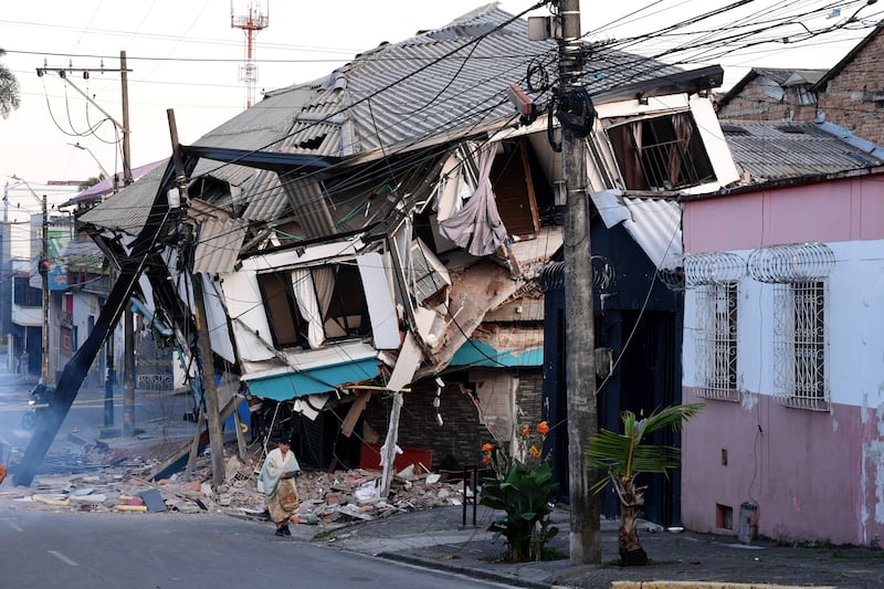 A collapsed house in Pereira, on Tuesday. Photograph: Jaime Saldarriaga/AFP via Getty Images