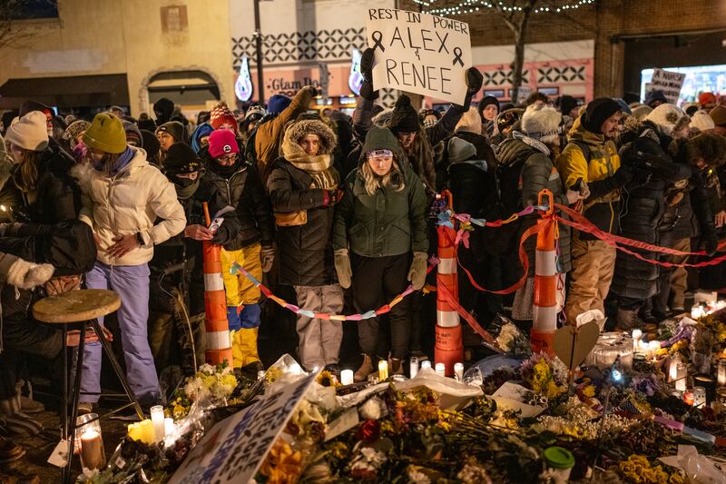 Mourners hold a candlelight vigil for Renee Good and Alex Pretti in Minneapolis last January. Photograph: Victor J. Blue/The New York Times
                      
